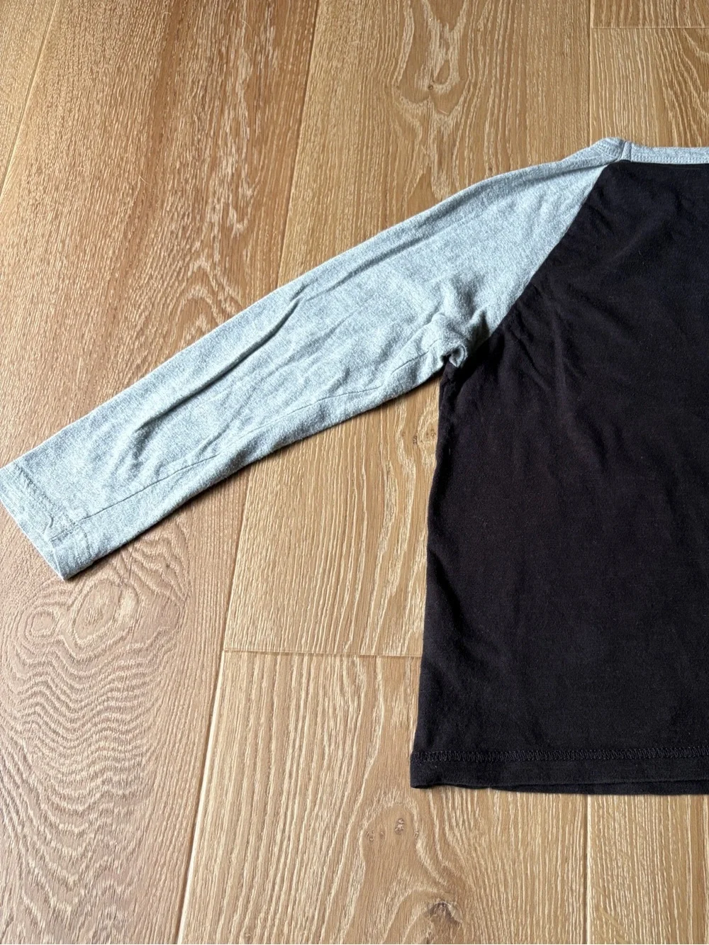 The Children’s Place Football Black Tee with Gray Neckline and Sleeves, size 5/6